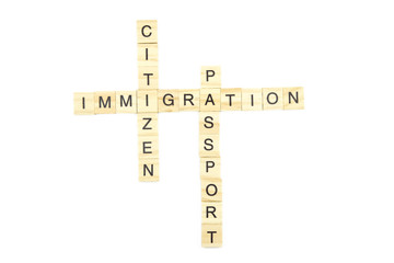 Immigration minimalistic concept. Isolated wooden letter blocks with word cloud Immigration citizen and passport