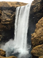 photo of a waterfall in iceland skogafoss