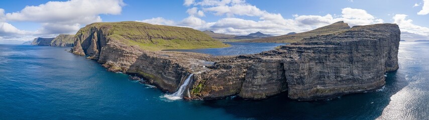 Leitisvatn lake and Bosdalafossur waterfall on Vagar island aerial view, Faroe Islands 32:9