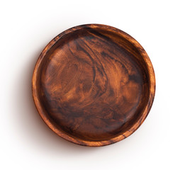 Wooden bowl isolated on a white background, view from above