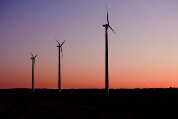 Alternative energy - wind turbines at dusk