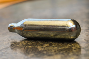 A small gad cylinder isolated on table. © Shyam
