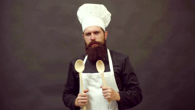Funny Chef cook with spoon fun training. Funny cook and comic cookery.