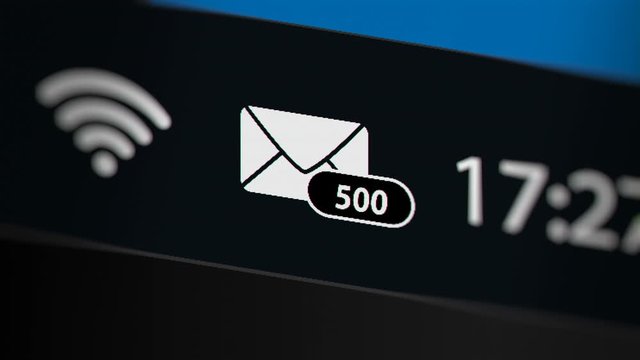 E-mail App Icon with Incoming E-mail Counter on Laptop Screen. 