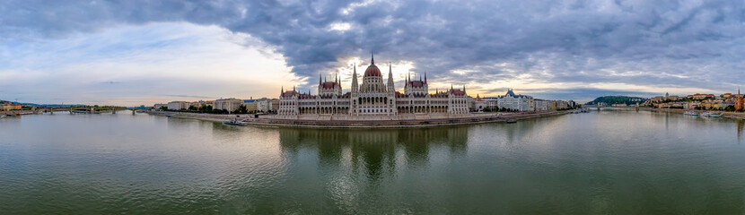 Fototapeta na wymiar Amazing panoramic aerial pgotos from Hungarian Parliament with clouds and splendid morning lights. 