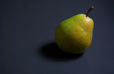 pear on black background