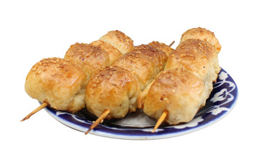 Uzek, Kazakh oriental cuisine. Baking Central Asian peoples on a white background.