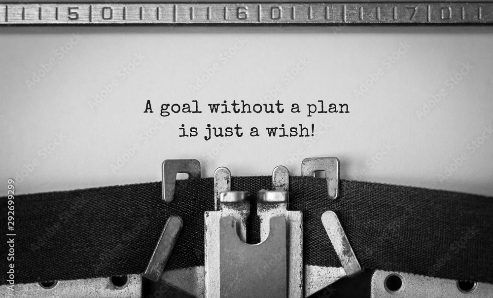 Poster text a goal without a plan is just a wish typed on retro typewriter