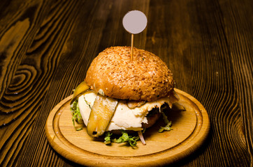 Bacon burger with on wooden table