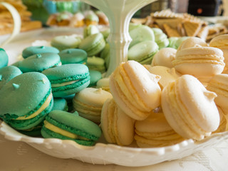 Close up sweet delicious macaroons love spoil concept