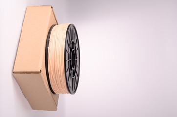 Filament for 3D Printer crystal clear and bright against a bright background.