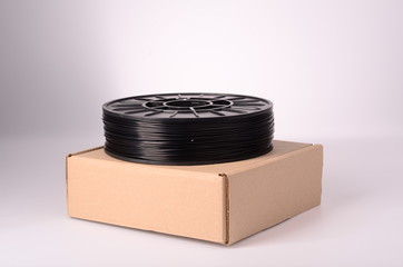 Filament for 3D Printer crystal clear and bright against a bright background.