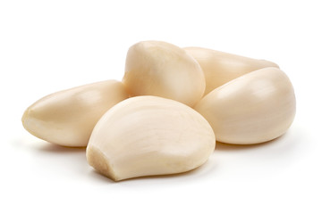 Fresh garlic cloves, isolated on white background