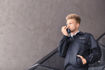 Male security guard in building