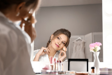 Morning of beautiful young bride before wedding