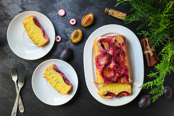 plum pie (delicious dessert, pastries with fruit) menu concept. food background. copy space. Top viev