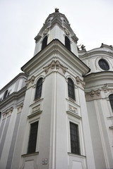 Fototapeta na wymiar historic buildings in Salzburg,here Kollegien church