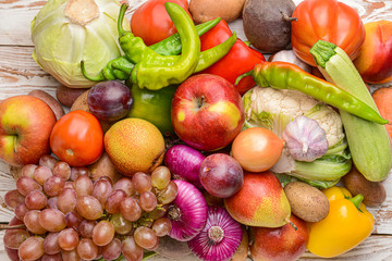 Many healthy vegetables and fruits on table