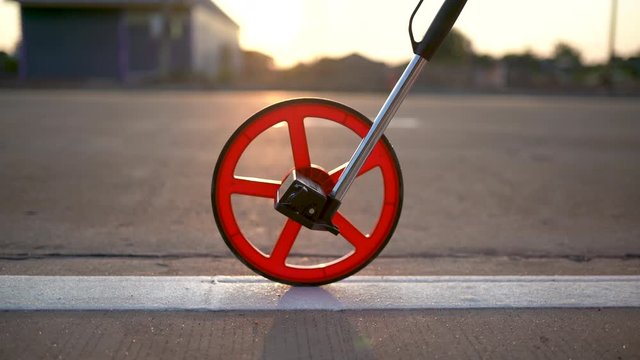 Sunset Distance measurement wheels on the road