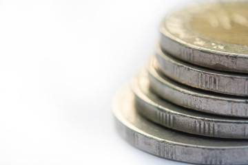 Close up Stack of coins on white background with copy space