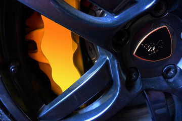 Sports Car, Yellow Brake Caliper, Blue Rim