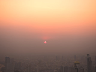 Obraz premium many building in pollution smoke in the city landscape showing office and recident towers, urban and road, panoramic view in perspective