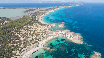 Fototapeta na wymiar Coast line with turquoise waters in Formentera