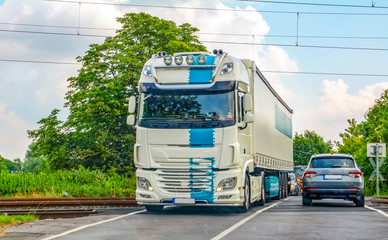 Truck with container on highway, cargo transportation concept.