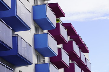 colored balconies of a house, make life brighter, decorate everyday life. bright colors of apartment building