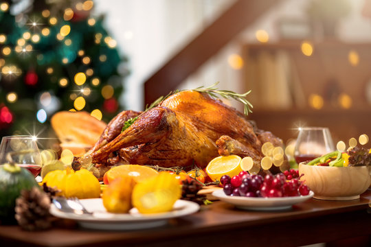 Homemade Roasted Thanksgiving Day festive tradition ideas concept Delicious Turkey with all the Sides on wooden table