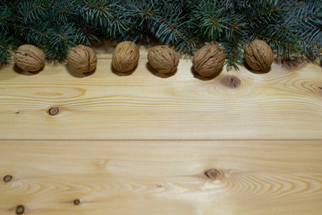 Beautiful celebratory Christmas background. New Year's holidays. Christmas holidays. Beautiful Christmas decorations on the wooden background