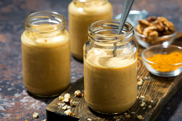 healthy carrot smoothies with turmeric, closeup