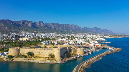 Fototapeta na wymiar Kyrenia (Girne) is a city on the north coast of Cyprus, known for its cobblestoned old town and horseshoe-shaped harbor.