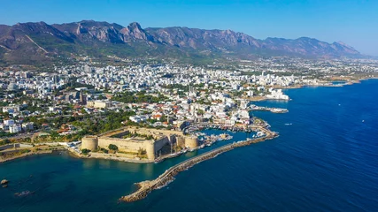 Gordijnen Kyrenia (Girne) is a city on the north coast of Cyprus, known for its cobblestoned old town and horseshoe-shaped harbor. © Tarik GOK