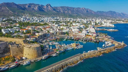 Gordijnen Kyrenia (Girne) is a city on the north coast of Cyprus, known for its cobblestoned old town and horseshoe-shaped harbor. © Tarik GOK