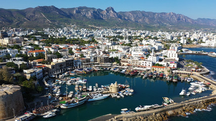 Kyrenia (Girne) is a city on the north coast of Cyprus, known for its cobblestoned old town and horseshoe-shaped harbor.