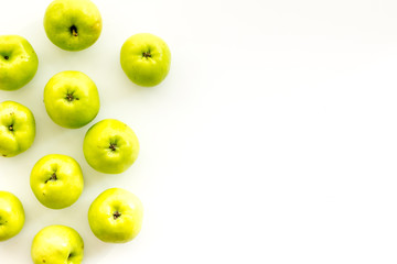 Green apples pattern on white background top view frame space for text