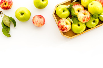 Healthy diet concept. Fresh apples in tray on white background top view copy space