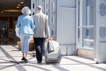Senior couple in airport