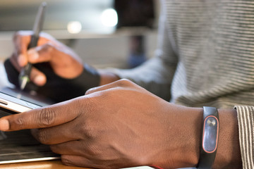 man writing on wacom tablet