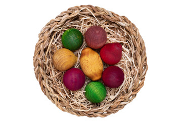 Air fresheners. Top view of the air freshener in a brown straw basket made of wooden balls and aromatized with essential oils. Macro of a nice gift isolated on a white background.