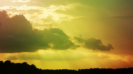 A warm toned view of an overcast sunset.