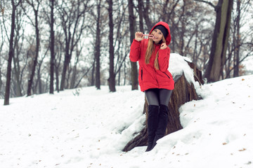 December walk with a young pretty blonde