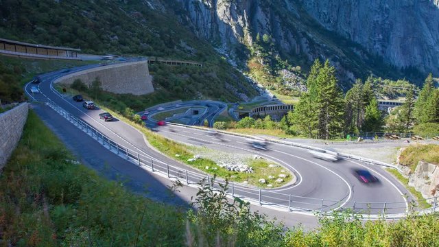Timelapse traffic on a road in mountains. Schoellenen Schlucht. Andermatt. Switzerland.