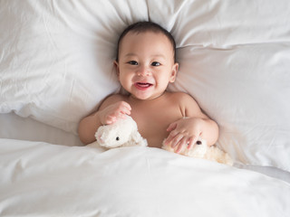 cute asian seven month baby smiling