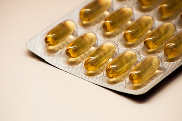 Omega 3 fish oil blister pack capsules, flax seed oil, health care concept