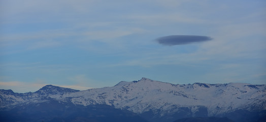 Fototapeta na wymiar a very special cloud over Sierra Nevada in Granada