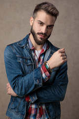 casual young fashion man wearing blue denim jacket