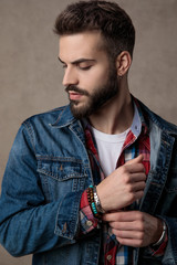 casual young fashion man wearing blue denim jacket