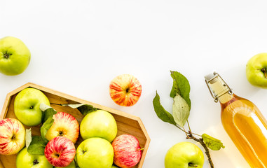 Vinegar made from fresh apple on white background top view space for text